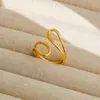 Anel ajustável de aço titânio bestseller da Tilini, joias de alta qualidade da moda para atacado, anel aberto para casais de homens e mulheres