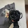 2026 Nuevo Diseño de Nicho de Moda Textura de Alta Calidad Versátil Cordón Hombro Único Cruzado de Hombro de Mano Patrón de Diamante Bolso Cubo