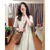 Novo vestido longo de verão feminino estilo japonês vintage, solto e casual, vestido emagrecedor de manga curta para mulheres baixinhas, com uma vibe descontraída