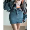 Falda vaquera con abertura para mujer, estilo fino de verano, nuevo modelo 2026, de cintura alta, adelgazante, negra, bodycon, línea A, minifalda