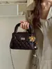 Bolso de mano de cadena con patrón de rombos estilo coreano para mujer, nuevo bolso de hombro retro de moda 2026, bolso cruzado versátil y moderno