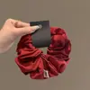 Goma para el pelo de tela texturizada de color sólido Estilo coreano Goma para coleta Estilo nuevo 2025 Simple y versátil Goma para el pelo roja y azul