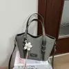 Bolso cubo de moda y sencillo para mujer, nuevo estilo coreano otoño 2026, alta estética, bolso de un solo hombro bajo el brazo