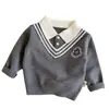 Suéter de punto para niño, estilo preppy, dos piezas simuladas, nueva colección otoño/invierno, top de punto bordado con cuello para niños