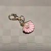 Estilo marino transfronterizo nuevo artículo charm de zapato de estrella de mar concha colgante azul marino hebilla de cordón de zapato compatible con papá de entrenamiento alemán zapatos de ballet