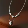 Collar de perlas de doble capa suave estilo francés para mujer, cadena para la clavícula de diseño de nicho de lujo ligero, accesorio moderno y elegante