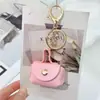 Bolsita Creativa para Guardar Auriculares, Billetera Pequeña, Llavero, Colgante para Bolso, Mini Bolsita de Almacenamiento Pequeña de Cuero