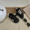 Tênis infantil 2026 outono novo estilo coreano sapatos casuais para meninas sola leve e macia biqueira de concha tendência para meninos tênis de treino alemão