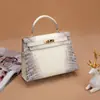 Bolso de Mujer Kelly Segunda Generación de Panza de Cocodrilo Transfronterizo de Europa del Este Bolso de Mano Blanco del Himalaya Bolso de Hombro Cruzado de Moda