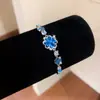 ¡Encanto floral azul brumoso! Pulsera de flor de circón azul, sensación de lujo ligero y alta gama, un accesorio dulce y fresco para niñas