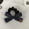 Estilo coreano hermanita 2024 nuevo alta gama exquisito mezclilla oscura lazo metálico banda de goma diadema cuerda para el pelo