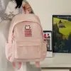 Nova mochila elegante de alta aparência para alunos do ensino fundamental e médio, mochila escolar leve e redutora de peso para meninas, mochila de viagem simples com desenho animado