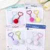 Colgante de cuentas de rompecabezas, llavero de corazón con pompón de colores, decoración de peluche suave y linda, accesorio de llavero de cuentas de rompecabezas hecho a mano