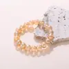 Europa y Estados Unidos pulsera de cristal de imitación transfronteriza pulsera de té de jade blanco de imitación negra color brillante clásico Joker joyería de color sólido al por mayor
