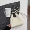 Elegante bolsa de cesta de mão para mulheres, nova moda 2026 bolsa balde simples para trabalho e deslocamento, bolsa transversal