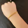 Pulseira Hip-Hop Masculina Europeia e Americana em Aço Titânio, Cor Dourada, Não Desbota, Lavável, Pulseira Cubana de Corrente Nk de Aço Inoxidável de Alta Qualidade