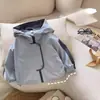 Jaquetas de Exterior para Crianças Bebê Outono 2026 Novas Jaquetas com Capuz Tops Roupas de Exterior de Outono para Crianças Corta-vento