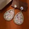 Pendientes de diamantes de colores retro creativos de venta caliente transfronteriza para mujer, pendientes colgantes de alta gama, joyería de oreja exagerada de moda, venta al por mayor