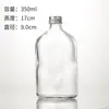 Botella de vidrio para bebidas al por mayor 250 ml botella de vino de frutas botella de jugo botella de té de leche botella de enzimas botella de vino pequeña se puede imprimir logotipo