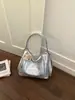 Nueva bolsa de estudiante de gran capacidad para mujer, versátil y texturizada, bolso de un solo hombro bajo el brazo, bolso de mano de cuero suave de moda