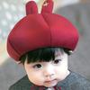 Versión coreana de gorra de protección para las orejas de conejo de dibujos animados al por mayor otoño e invierno nuevo para niños y niñas orejas largas gorra fina de terciopelo 2098