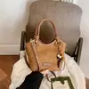 Bolso de gamuza para mujer 2026 nuevo otoño vintage de alta gama para el trabajo de un solo hombro cruzado tipo cubo