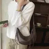 Bolso tipo dumpling minimalista de estilo coreano para mujer, nuevo bolso de hombro versátil de moda otoño 2026 para salidas diarias y para ir al trabajo, bolso cruzado