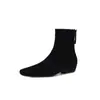 Combinados con un abrigo, estos botines Chelsea de ante irradian elegancia.. Invierno 2026, tacón bajo grueso, punta cuadrada, botines de piel genuina para mujer