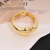 Pulsera de oro estilo europeo y americano para mujer, accesorio de brazalete abierto exagerado, joyería de brazalete plateado metálico brillante
