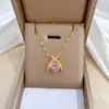 [Acero de titanio] conjunto de collar y pendientes de gota de agua cruzada lujo ligero micro incrustaciones personalidad temperamento pendientes de banquete combinación de collar