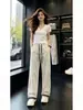 Pantalones casuales de cuadros rectos de secado rápido en blanco para hombres y mujeres, pantalones finos de seda helada transpirables holgados de verano, pantalones deportivos estilo americano