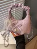 Bolso plisado de diseño único y nicho para mujer, nuevo bolso cruzado de moda 2026, bolso de mano pequeño súper popular, bolso de cuerno