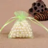 Bolsa de hilo para joyería al por mayor de fábrica color liso hilo de perla bolsa para dulces de boda empaque de joyería color liso bolsa de malla de gasa organza