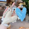 Estilo Coreano Ins Dulce Estilo Girly Relleno de Algodón Corazón Cadena de Perlas Colgante de Bolso Accesorios para Bolsos Llavero Colgante Pequeño