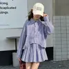 Conjunto de camisa a cuadros estilo coreano y falda plisada para niñas 2026 nuevo conjunto elegante dulce y moderno de primavera y otoño para niñas