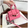 Colección nueva 2025: bolsos de mano elegantes y modernos para mujer, con material de PU de colores de caramelo, minibolso bandolera y monederos lindos