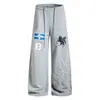 Pantalones de chándal anchos estilo americano, de peso pesado, con un unicornio bordado, que presentan un diseño relajado y moderno, perfectos para uso casual y fáciles de combinar con varios atuendos.