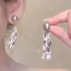 Pendientes de Perla Pétalo Francés para Mujer 2026 Nuevo Estilo Caliente Otoño/Invierno Clavillos Estilo Resort Adornos para Orejas