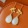 Pendientes Xi de gota de agua de jade blanco y oro antiguo para mujer, largos, estilo clásico artístico retro con pájaro urraca