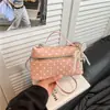 2026 Verão Nova Bolsa Doce Retrô com Bolinhas Lancheira Bolsa para Mulheres Ombro de Alta Qualidade Transversal Encontro Atacado Bolsa Feminina