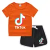 2023 Verão Infantil Gola Redonda Camiseta Calças Quentes Coreano Casual Base Camisa Suor-absorvente Doce Conjunto de Camiseta Infantil