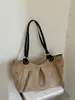 Bolso de mano vintage de gamuza estilo coreano para mujer, nuevo y moderno para otoño e invierno 2026, bolso de hombro de alta gama de gran capacidad para el trabajo