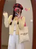 Cárdigan de punto liso estilo coreano para mujer, nueva colección primavera y otoño, estilo suave y delicado, prenda exterior para mujeres petite, ropa de mujer de moda
