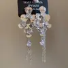 Brincos de Flor de Zircônia Super Brilhante com Borla de Gota D'água Agulha de Prata Moda Europeia e Americana Brincos de Metal Luxo Leve Brincos de Alta Qualidade para Mulheres