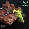Barraca de Ano Novo Pequenos Itens 8cm Mini Roxo Dourado Frenesi Garra Faca Arma Adereço Modelo de Liga Chaveiro Atacado