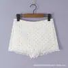 Saia de Bolinhas para Mulheres 2026 Verão Novo Estilo Estilo Pura Desejo Acabamento em Renda Cintura Alta Emagrecedora Linha A Curta