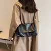 Bolso de mano grande de alta gama, estilo vintage, para mujer, nueva colección 2026, bandolera de cadena moderna y versátil, adecuado para ir al trabajo