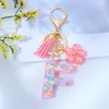 Lentejuelas de Estrella Rosa Pegamento Líquido Llavero con Letra Colgante de Flor Colgante para Bolso DIY Regalo para Novia