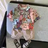 Traje de verano para niños con estampado completo de oso de dibujos animados estilo coreano ropa de verano para niños de 0 a 5 años niños pequeños de verano manga corta