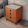 Mesita de noche madera maciza lujo ligero simple moderno hogar dormitorio tablero de roca armario de noche bolsa suave armario de almacenamiento de cuero venta al por mayor